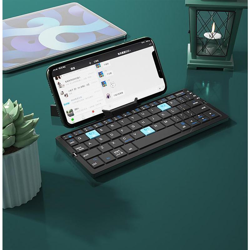 2026 Mini Folding Bluetooth Keyboard Wireless Keypad Support3 Devices With Stand Rechargeable Foldable Keyboard for Phone Tablet