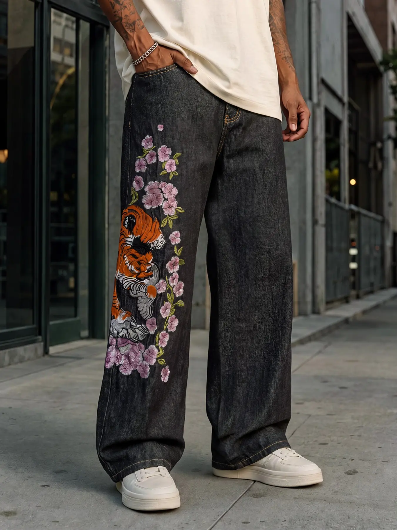 Men's black Japanese-style straight-leg jeans, featuring tiger and floral embroidery design, vintage street fashion style, suitable for all seasons