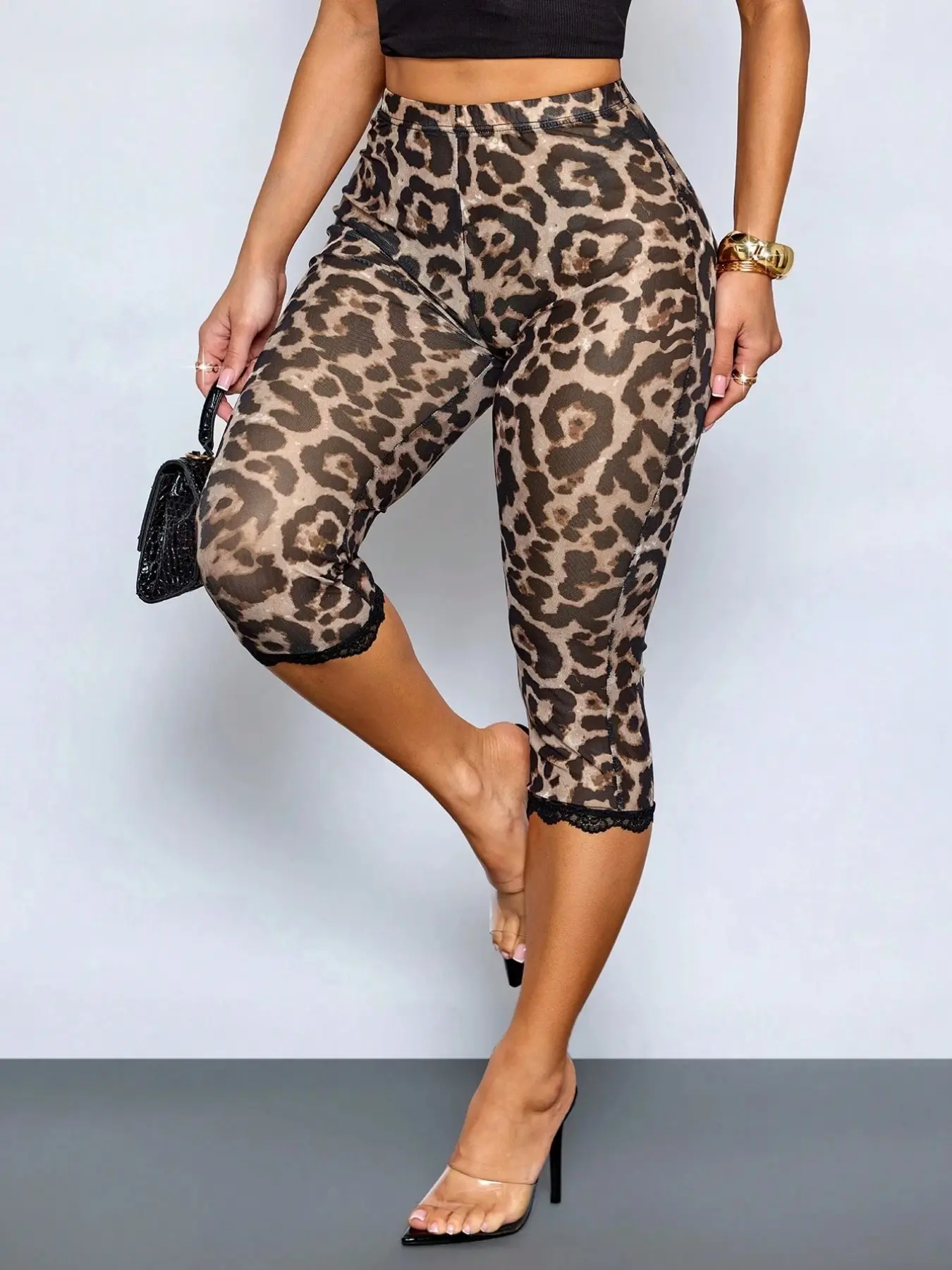 Women's hot and sexy leopard print capri leggings with lace trim, perfect for daily casual wear, street style, work, or parties. Made from stretchy, comfortable, lightweight, and breathable fabric that fits all body types #Y2KStyle #LeopardCapris