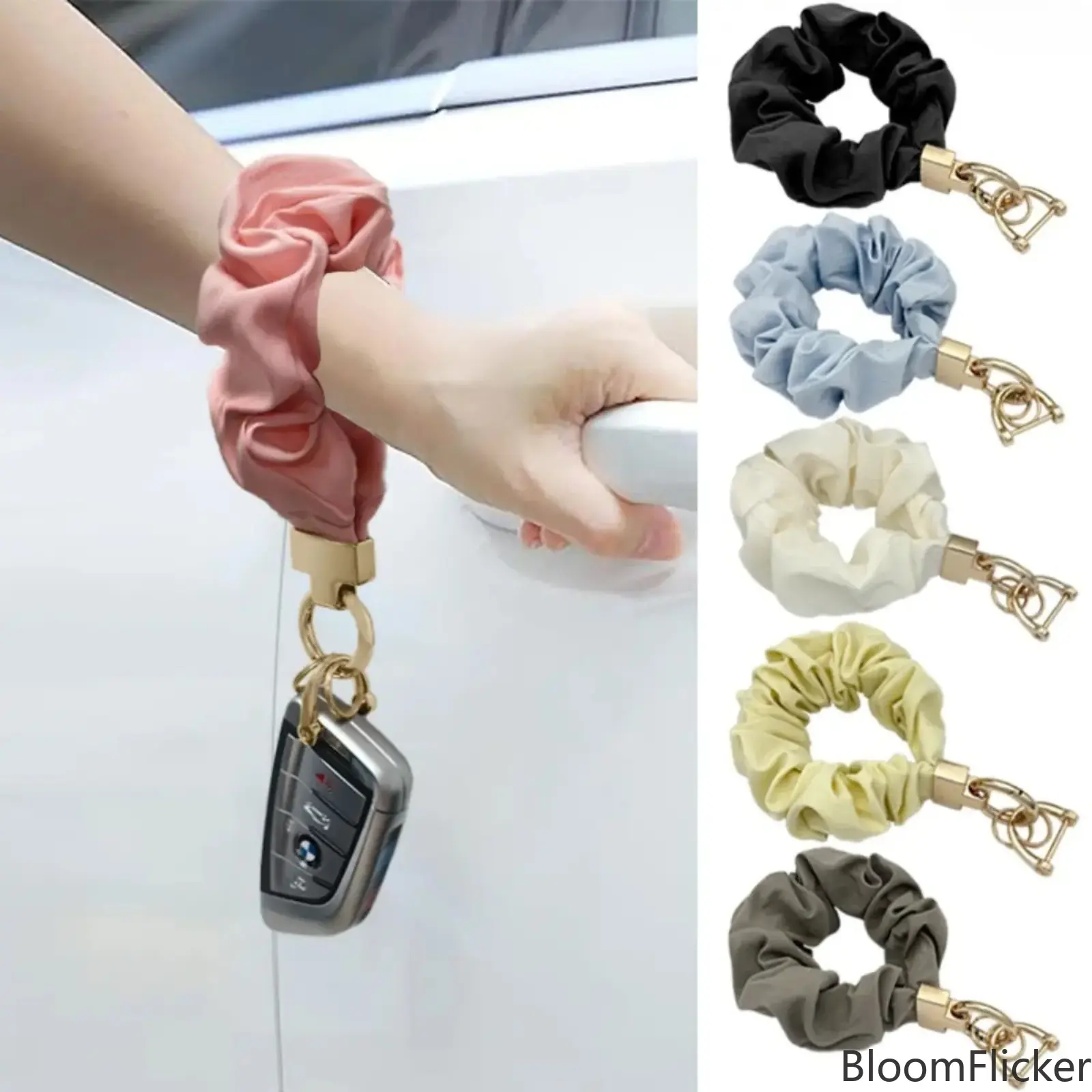 Soft fabric scrunchie‑style wrist keychain with a detachable metal ring. Lightweight portable wristlet strap works for car keys, water bottles and handbag pendants. Practical everyday‑carry decorative accessory tailored for women