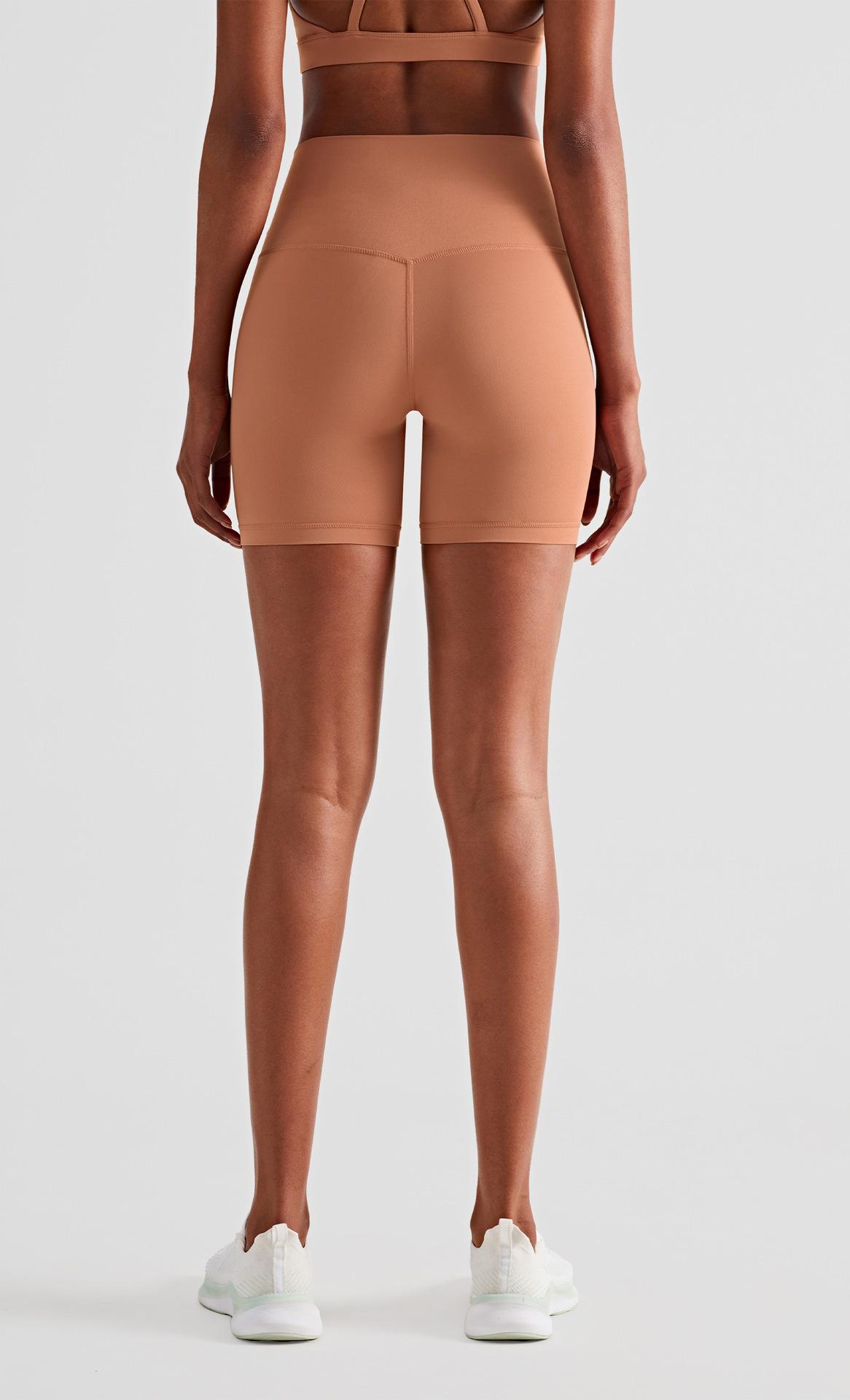 Spring and summer nude-feel running sports shorts for women, high-waisted, tummy-tightening, butt-lifting, three-quarter length pants for fitness, outdoor cycling, and yoga
