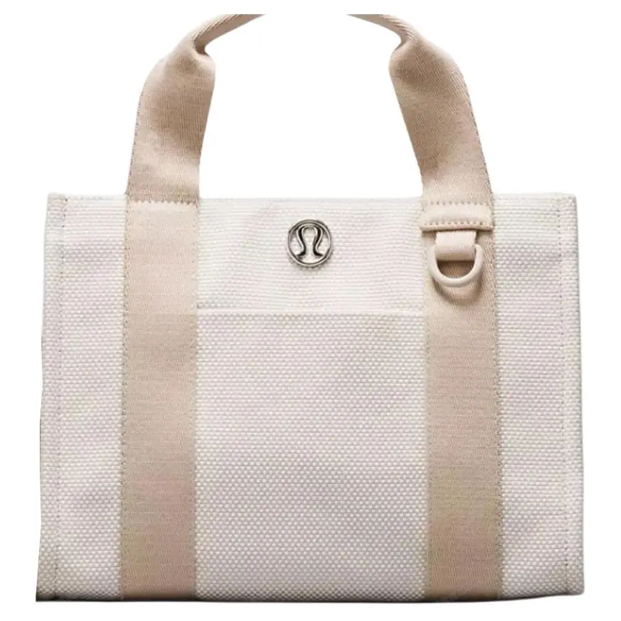 Lululemon 10L Two-Tone Cotton-Blend Canvas Tote Bag for Women – Mojave Tan and Light Ivory Lululemon 10L Two-Tone Cotton-Blend Canvas Tote Bag for Women – Mojave Tan and Light Ivory