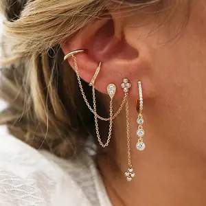 Elegant double-pierced earrings for women with integrated tassel pendant