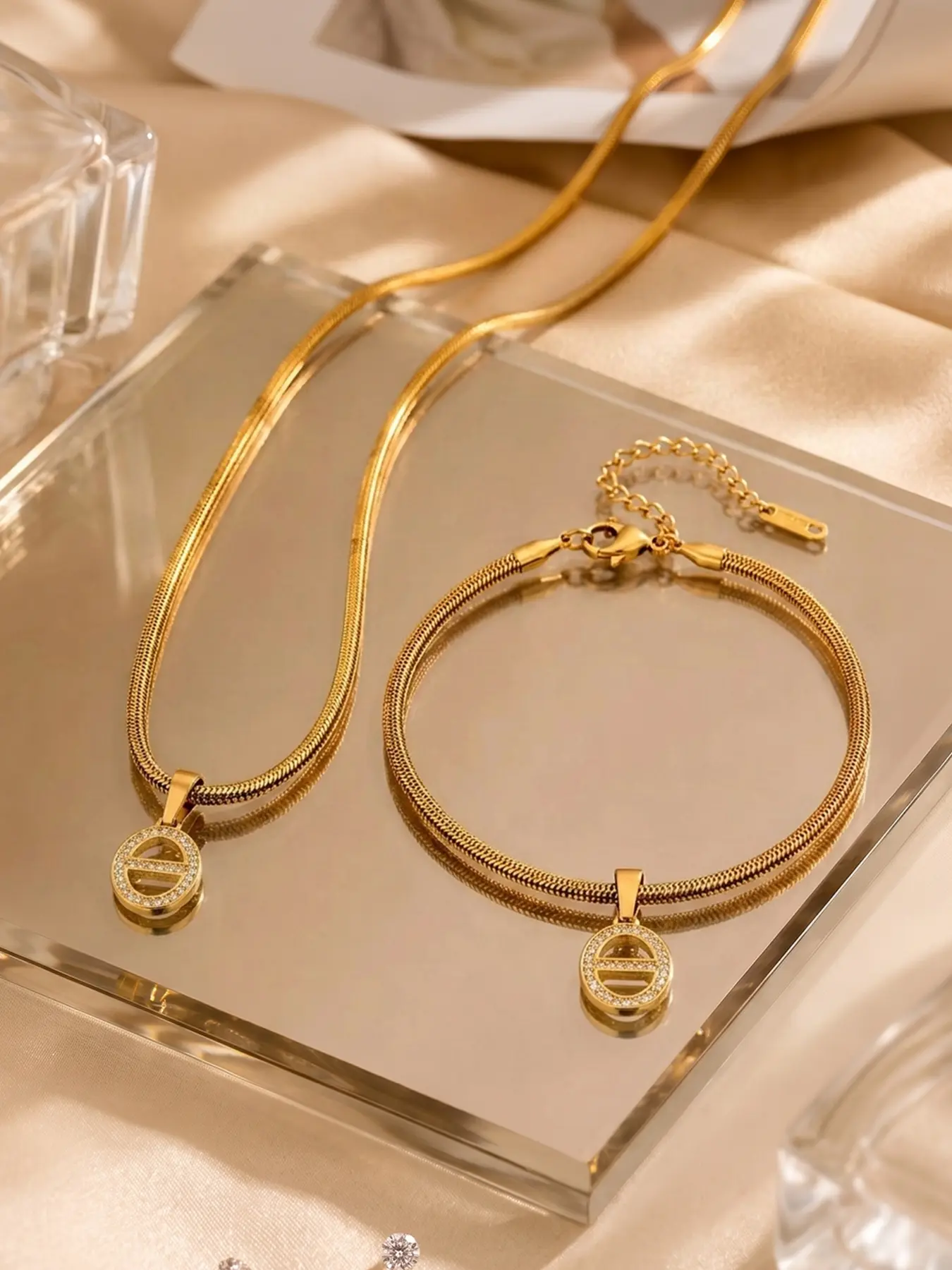 2pcs hollowed out circular cross bar diamond studded snake bone necklace and bracelet set, suitable for daily wear by office workers to enhance the delicacy of dressing, and can also be given as a commemorative gift to women