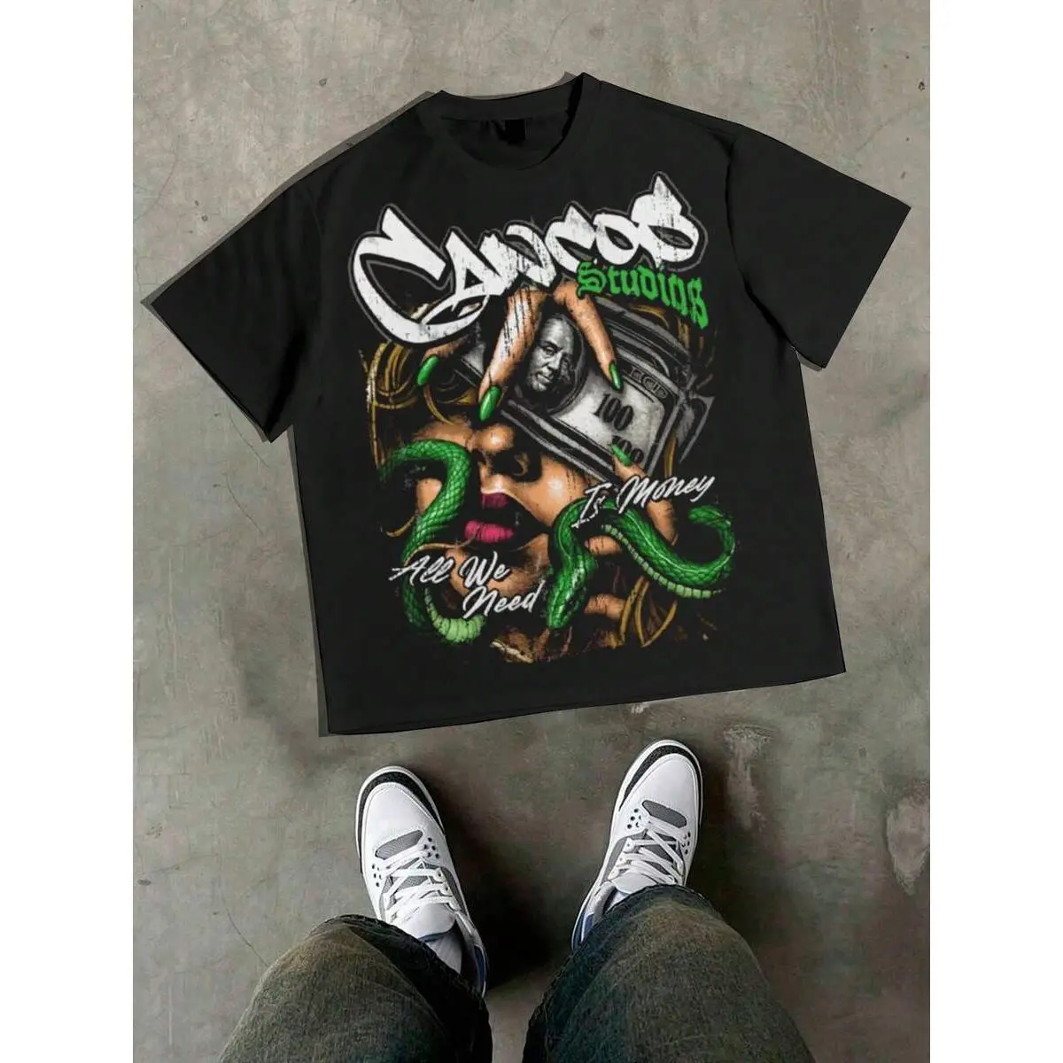 1 PCS Streetwear "Chasing Paper - Snake & Dollar" Graphic Tee: Featuring Distressed Vintage Finish, Front Artistic Illustration With Green Snake, Dollar Bill, Stylish "All We Need Is Money" Text & "Caviar Studios" Branding