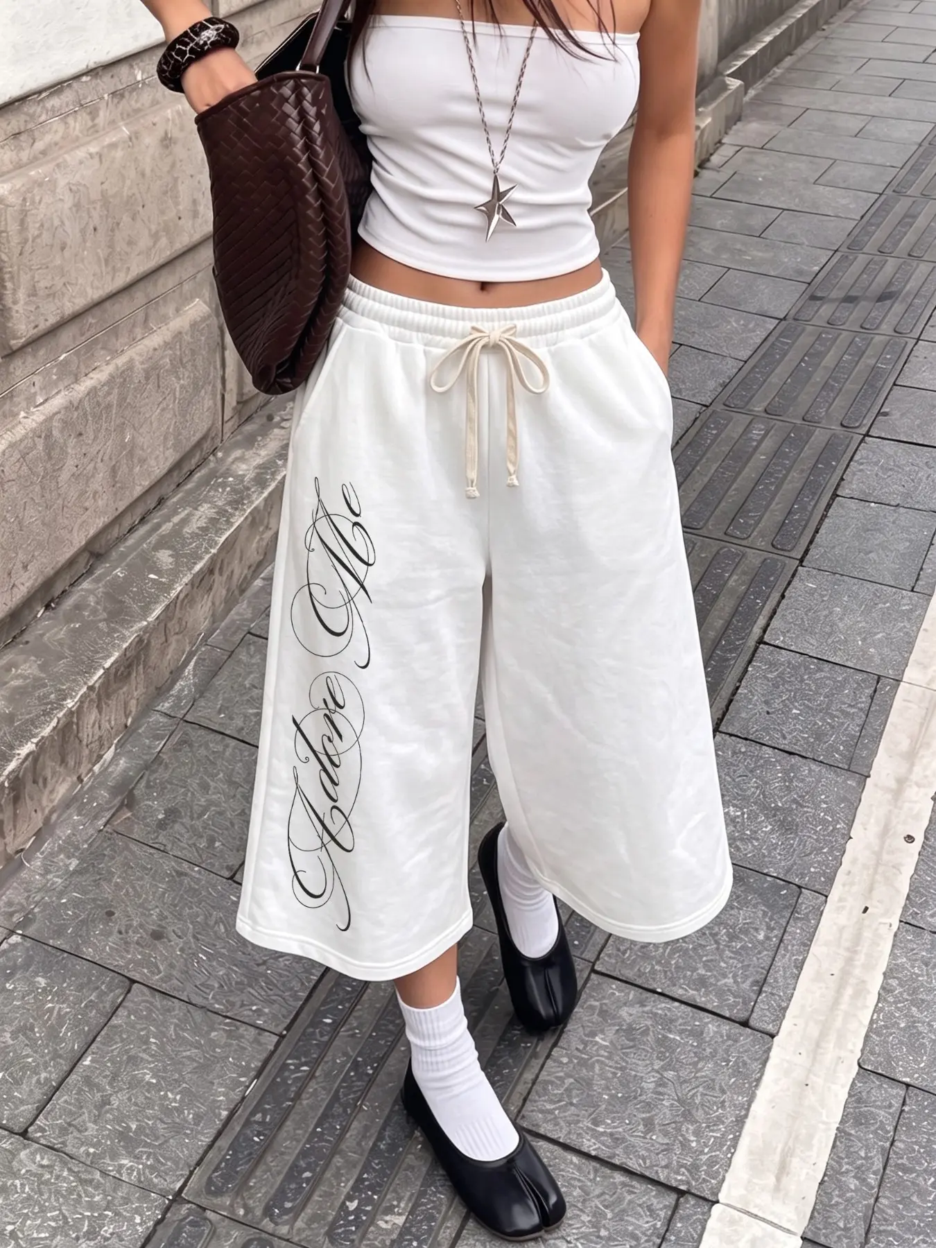 Women Summer Casual Cropped Capri Sweat Pants Solid Cream White Elastic High Waist Matching Beige Drawstring Vertical Flowing Cursive Script Graphic Print Oversized Loose Wide Leg 7/8 Length Lightweight French Terry Jogger Trousers Side Pockets Minimal Co