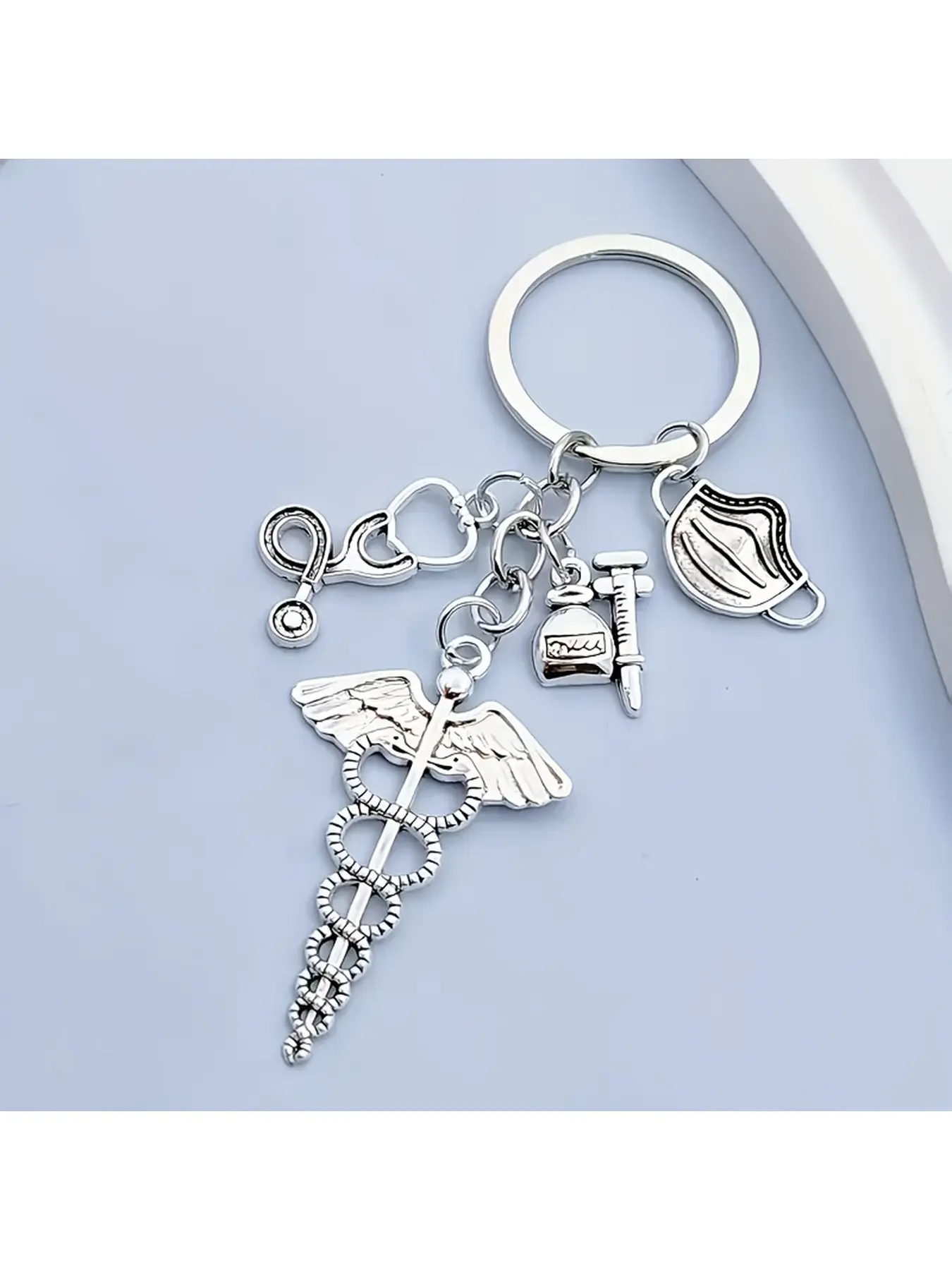 A Creative Double Snake Staff Keychain - Design Theme Includes Medical Bags, Masks, Stethoscopes, And Medical Instruments, Making It a Perfect Gift for Doctors And Nurses