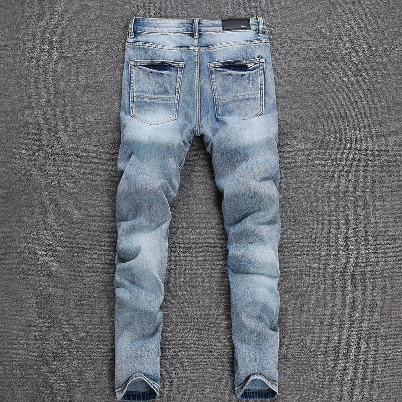 YYK Brand: Street-Style Distressed, Skinny-Fit Stretch Jeans-Featuring Patches, Embroidery, and a Vintage Denim Aesthetic-Showcasing Casual and Fitness-Inspired Styling