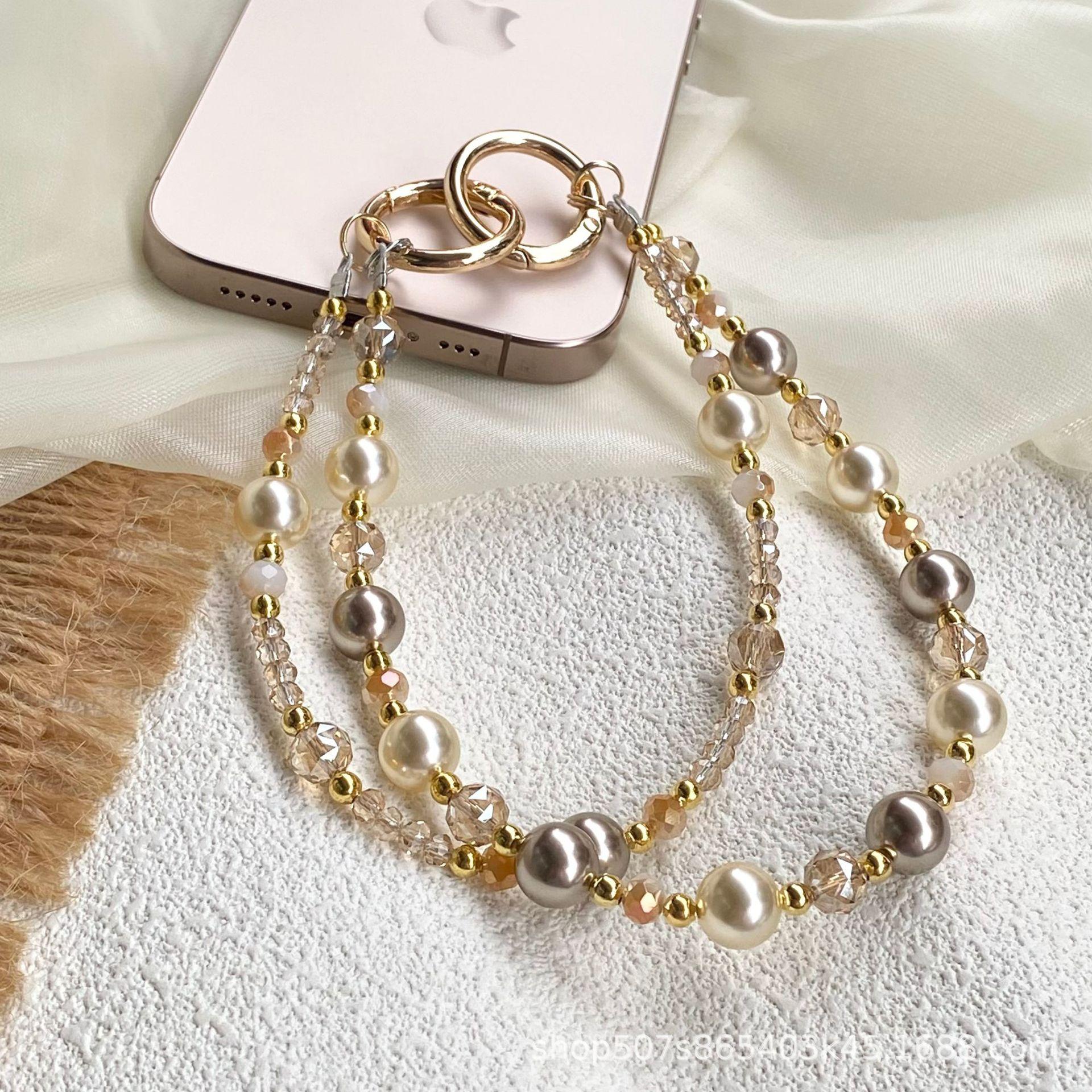 Amber gold foil bead crystal double-chain phone strap, high-end anti-loss pendant chain, luxurious style keychain phone strap