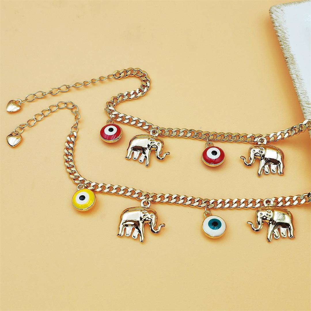 Gold Devil's Eye Lucky Elephant AnkletY2K Aesthetic Red Evil Eye Pendant Anklet Adjustable Gold Plated Chain Anklet for Party Birthday Holiday Gift Daily Wearwith Baby Elephant Pendant Adjustable Length for Stylish Accessory