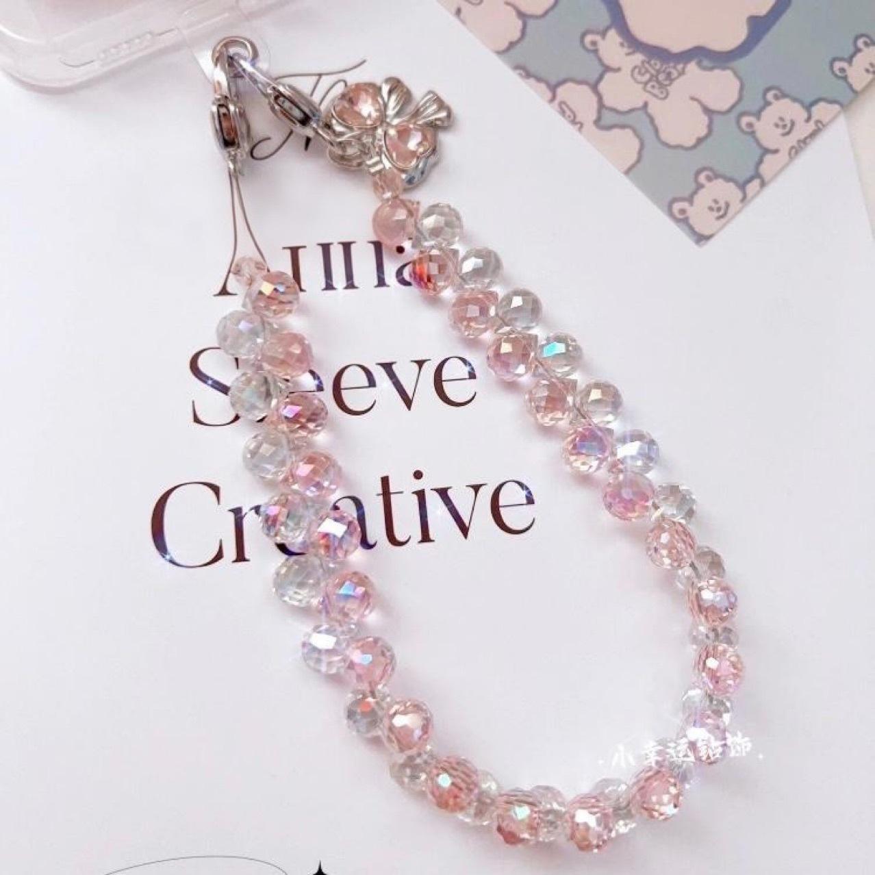 Luxurious, dazzling, high-end crystal water drop bead chain, strawberry crystal phone chain, bag accessory, keychain