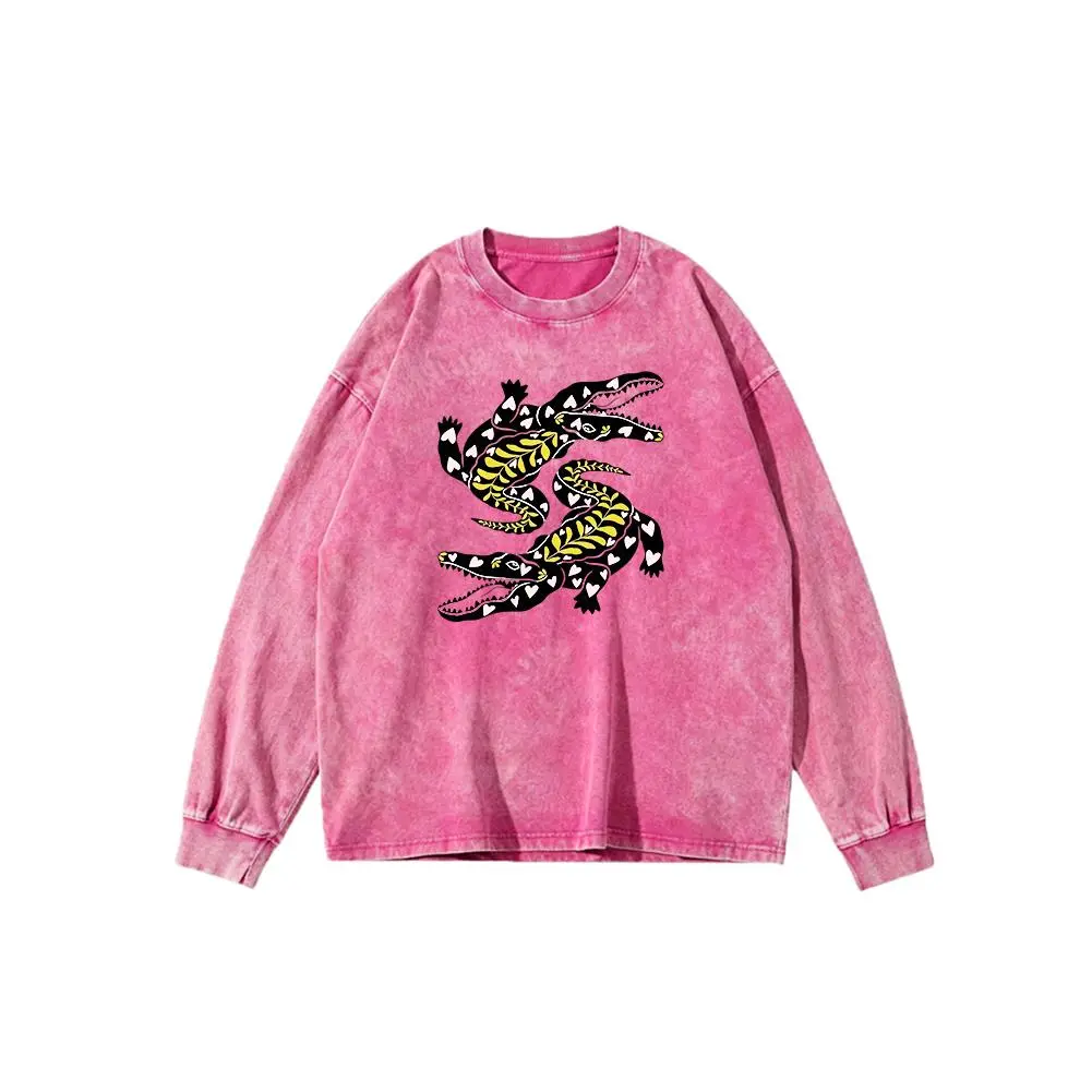Garment-washed crew-neck long-sleeve sweatshirt; loose-fit long-sleeve top featuring a dual-crocodile graphic; vintage animal-themed streetwear style.