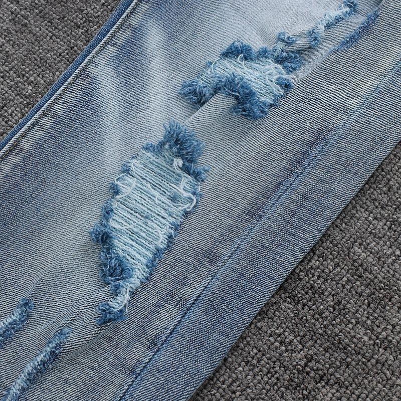 YYK Brand: Street-Style Distressed, Skinny-Fit Stretch Jeans-Featuring Patches, Embroidery, and a Vintage Denim Aesthetic-Showcasing Casual and Fitness-Inspired Styling