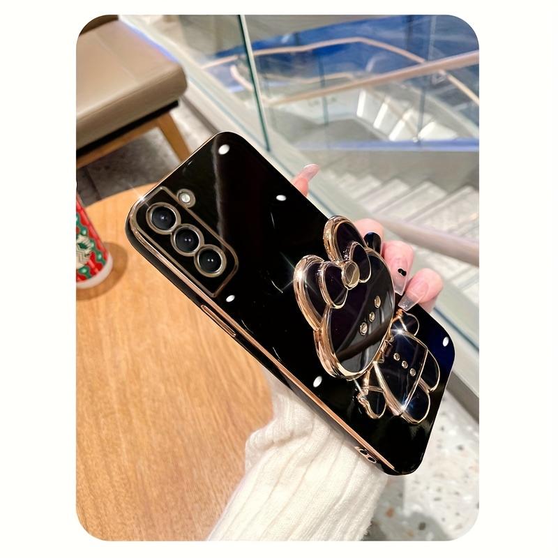 New rabbit-shaped adhesive phone stand with makeup mirror is suitable for iPhone, Samsung, Xiaomi phones, and various other phones. The rabbit phone case desktop stand is a hollow-out lazy stand