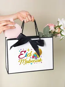 Eid Mubarak Gift Bag with Ribbon Handle, Reusable Festival Bag, Elegant Paper Bag with Colorful Text, Ideal for Ramadan Gifts