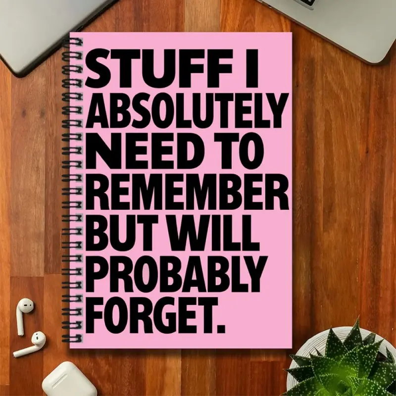 A spiral-bound notebook for reminders, To Do List Notebook, perfect for work and study! The cover reads "STUFF I ABSOLUTELY NEED TO REMEMBER BUT WILL PROBABLY FORGET," making it a graduation or birthday gift. Suitable for journaling, daily planning