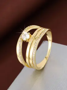 A minimalist design ring with crossed lines and artificial zirconia stones for a lady