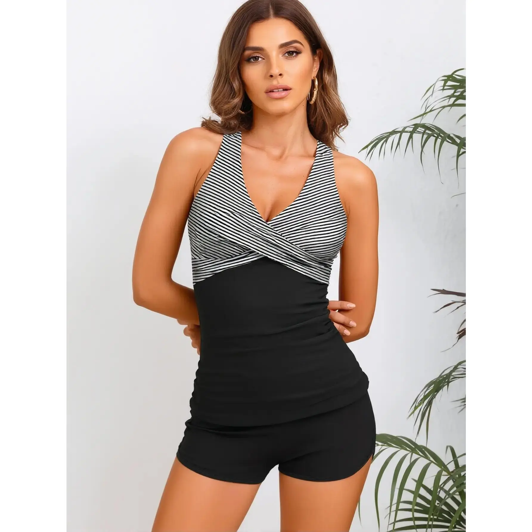 New European and American style women's two-piece tankini swimsuit with boxer shorts, tummy control, slimming effect, and printed design, suitable for casual wear at the beach or pool