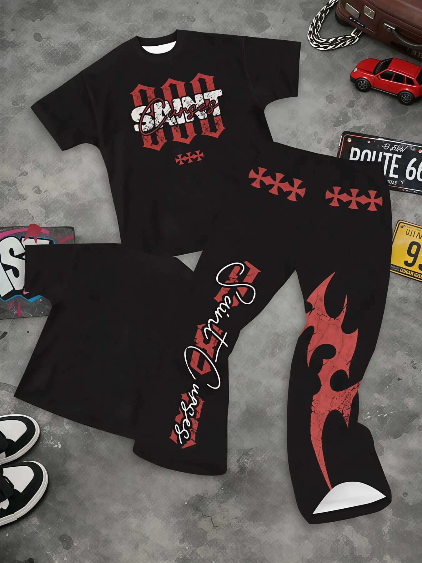 Grunge Dark Street Men 2Pcs Matching Set, Saint Cross Distressed Letter Cracked Flame Print Tee Curved Flare Pant Set, Adult Men For Night Out Urban Casual Meet, Trending Vintage Gothic Mens Tracksuit