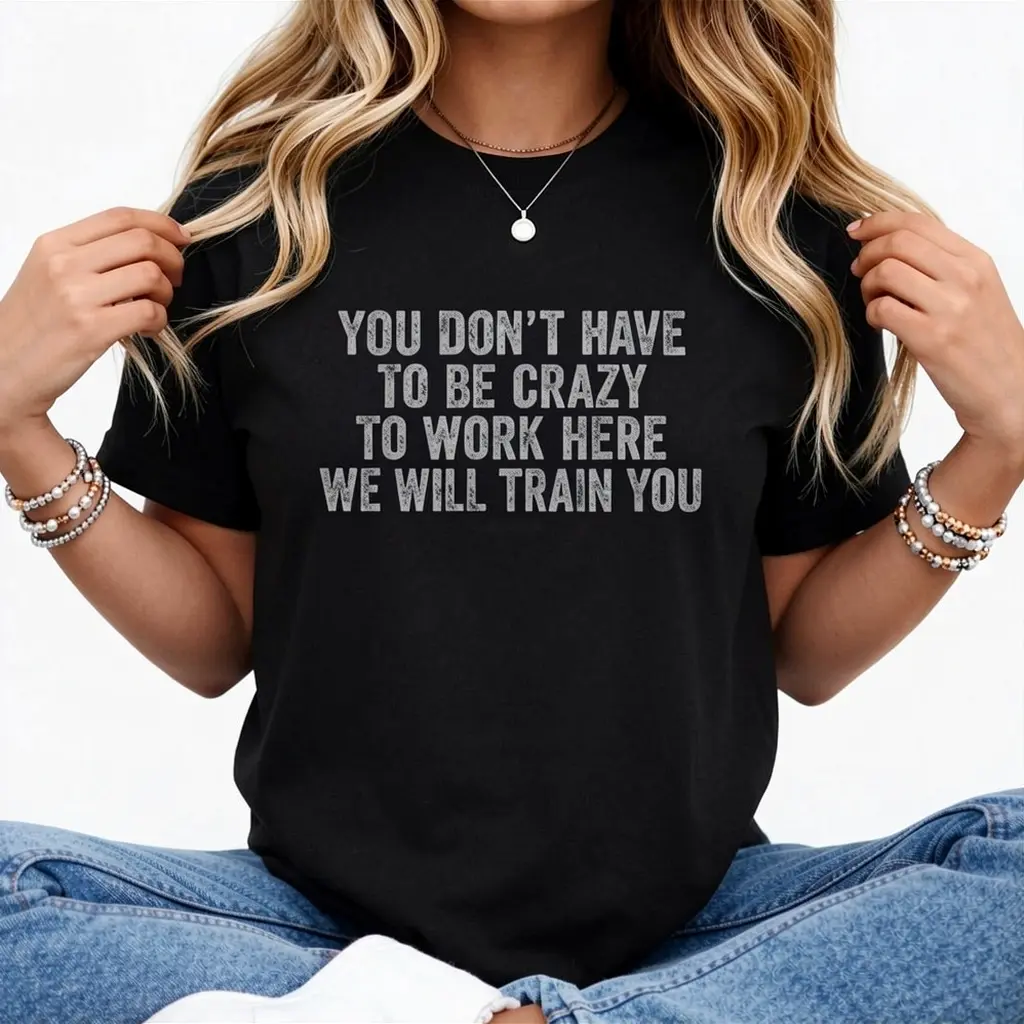 Men's Graphic Short Sleeve Top - Funny Workplace "You Don't Have to Be Crazy to Work Here" Office Humor Heavyweight 100% Cotton Crewneck Shirt for Men, Black with White Text, S-XXXL, Casual Office Party Apparel Round Neck Menswear