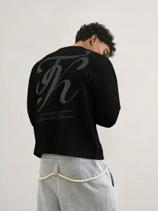 Y2K Black Cropped Crew Neck Long-Sleeve T-Shirt, Short, pullover top with large vintage faded script letter K print on the back, lightweight street base layer printed with small slogan phrases, Skin-friendly and breathable, it accentuates the waistline