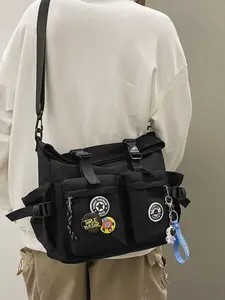 Fashion lazy style large-capacity multi-pocket messenger bag, paired with cute cartoon badge accessories, adjustable wide strap unisex daily commute crossbody/sling bag