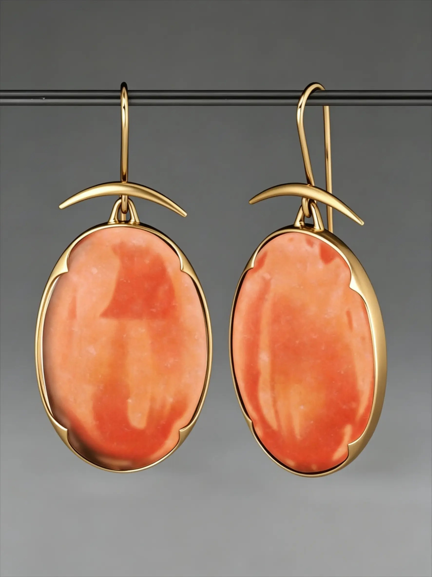 A Pair Of Vintage Orange-Red Oval Faux Amber Earrings Perfect For Niche Fashion Events Parties Women’s Everyday Wear And Commuting Versatile And Exuding A Gentle Atmospheric Vibe