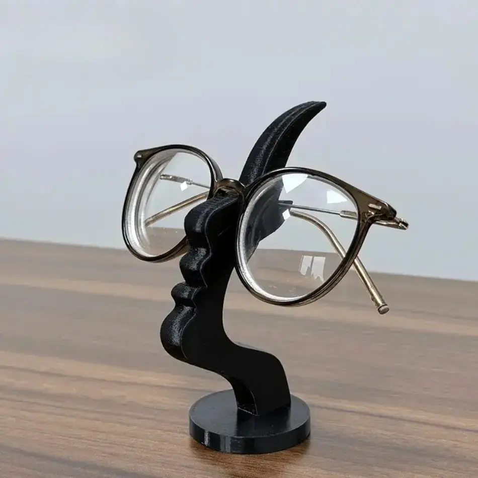 Unique Artistic Face‑Shaped Eyeglasses Stand, Curved Recycled‑Material Glasses Holder, Stylish Desktop Eyewear Storage Organizer, Decorative Home Table Ornament, Practical Spectacle Display Rack for Bedroom Office Desk, Thoughtful Holiday & Housewarming G