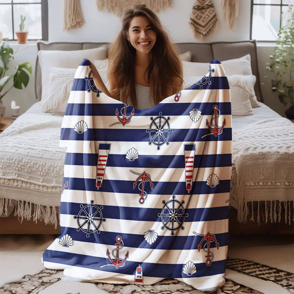 A soft and comfortable flannel blanket with a blue and white striped nautical-themed pattern. It's suitable for use at home, in the office, during camping, on sofas, and in beds as a warm blanket, and it's also a great gift choice.