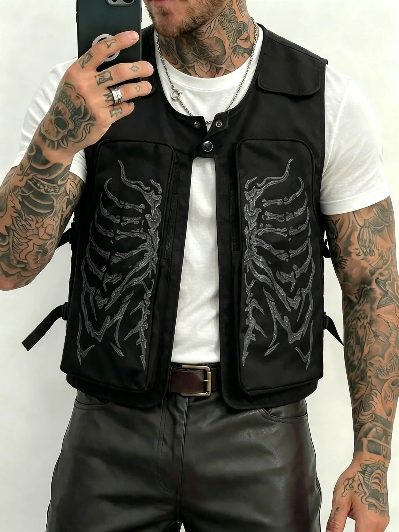 Biker-style vest featuring a 3D skull print and Halloween elements; a lightweight, layerable piece perfect for a distinctive street-style or skate-inspired look.