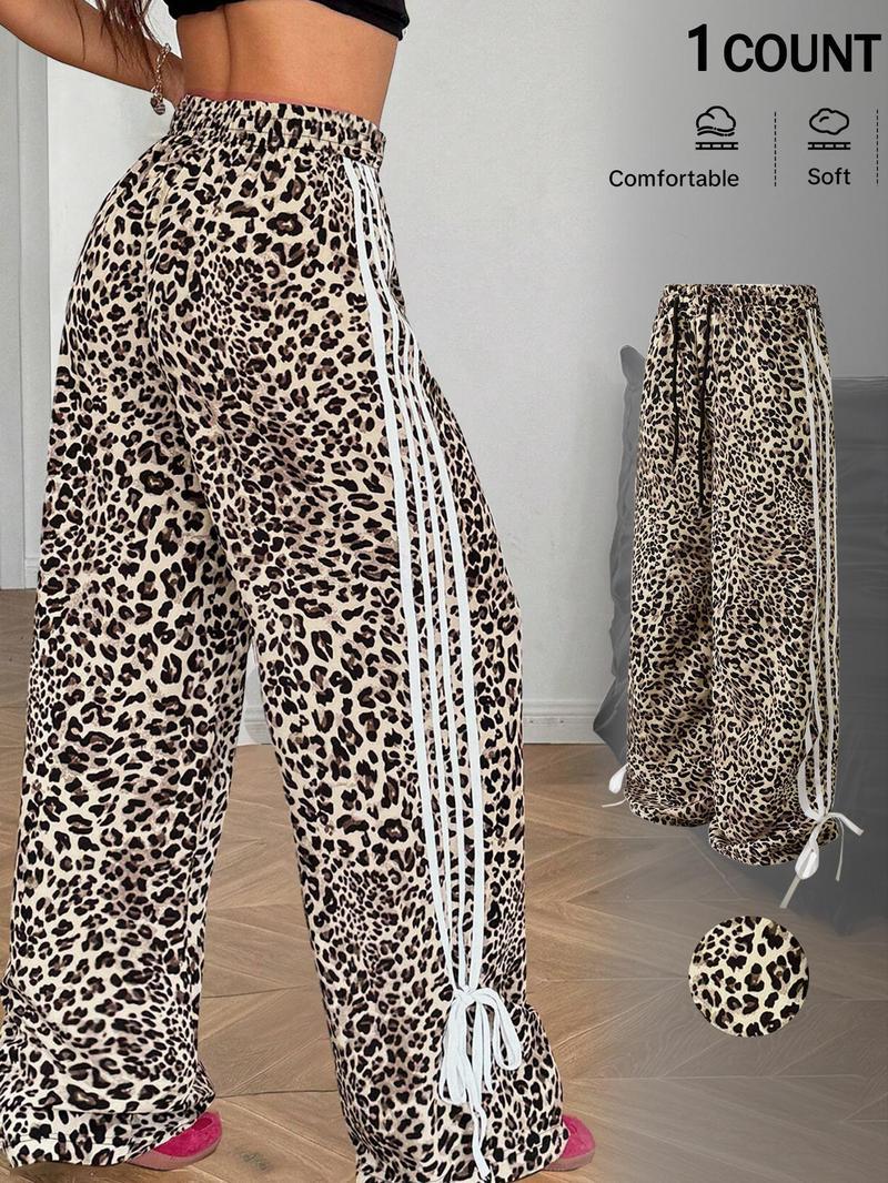Women's Leopard Print Sweatpants Side Stripe Wide Leg Pants Y2K Streetwear Baggy Trousers with Bow Hem，Trendy Leopard Print Track Pants High Waist Loose Fit Casual Joggers Soft Comfy Lounge Trousers for Women，Hip Hop Street Dance Bottoms Fashion