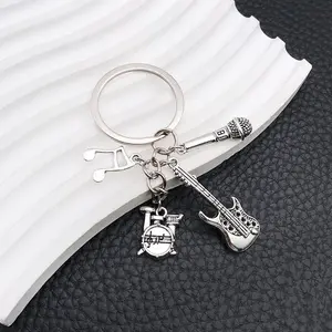 Accessories for music lovers: keychains, drum set, music notes, microphones, musical instruments, backpack pendants, small gifts