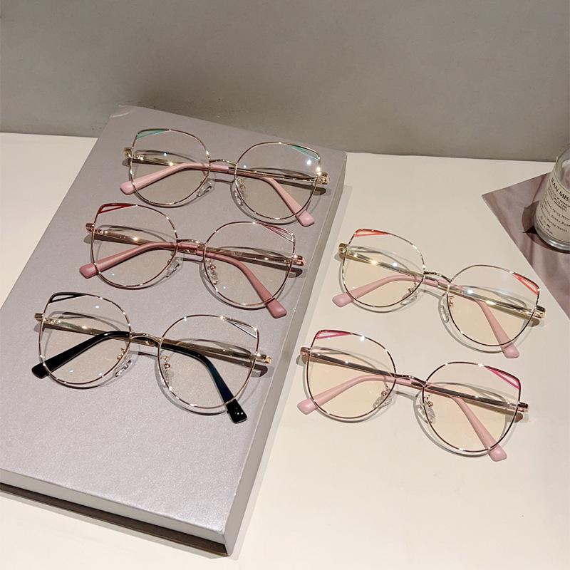High quality cat eye hollow metal eyeglass frame fashion simple anti blue light glasses for women Computer goggles flat lens
