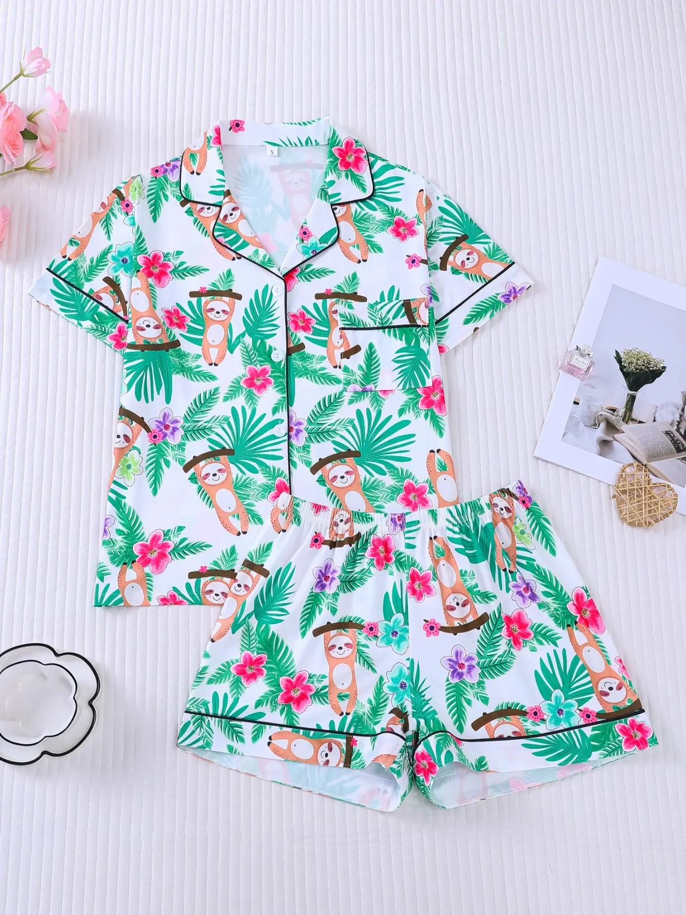 Women's 2-piece pajama set, Collared sleepwear, with cartoon sloth tropical palm & pink purple flower print summer style black contrast piping Lapel short sleeve top with pocket soft elastic waist shorts women loungewear for all-season home wear