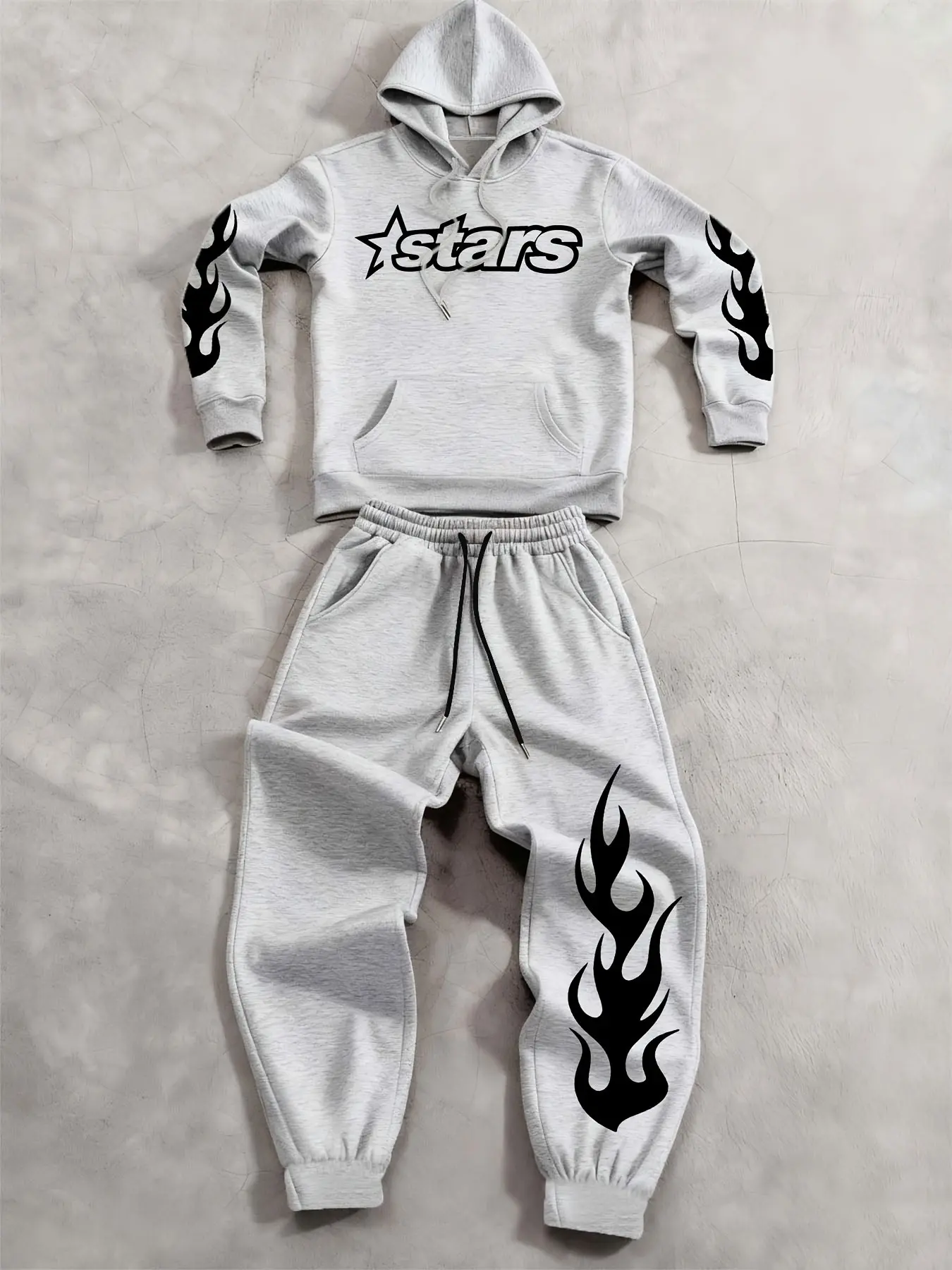 Viral TikTok Y2K-style two-piece men's tracksuit, consisting of a soft, wrinkle-resistant hoodie paired with jogger sweatpants. The hoodie features an adjustable drawstring hood, front kangaroo pockets and elastic cuffed pant hems. It comes with eye-catch
