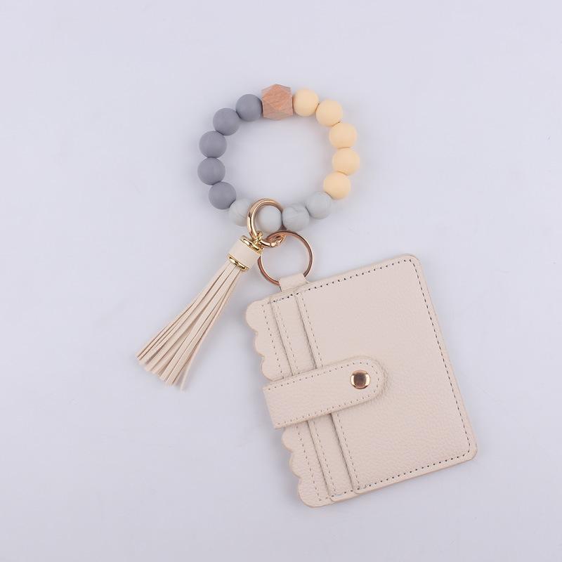 Silicone bead bracelet card holder accessories, silicone bead wristband, PU tassel women's wallet, leather tassel keychain