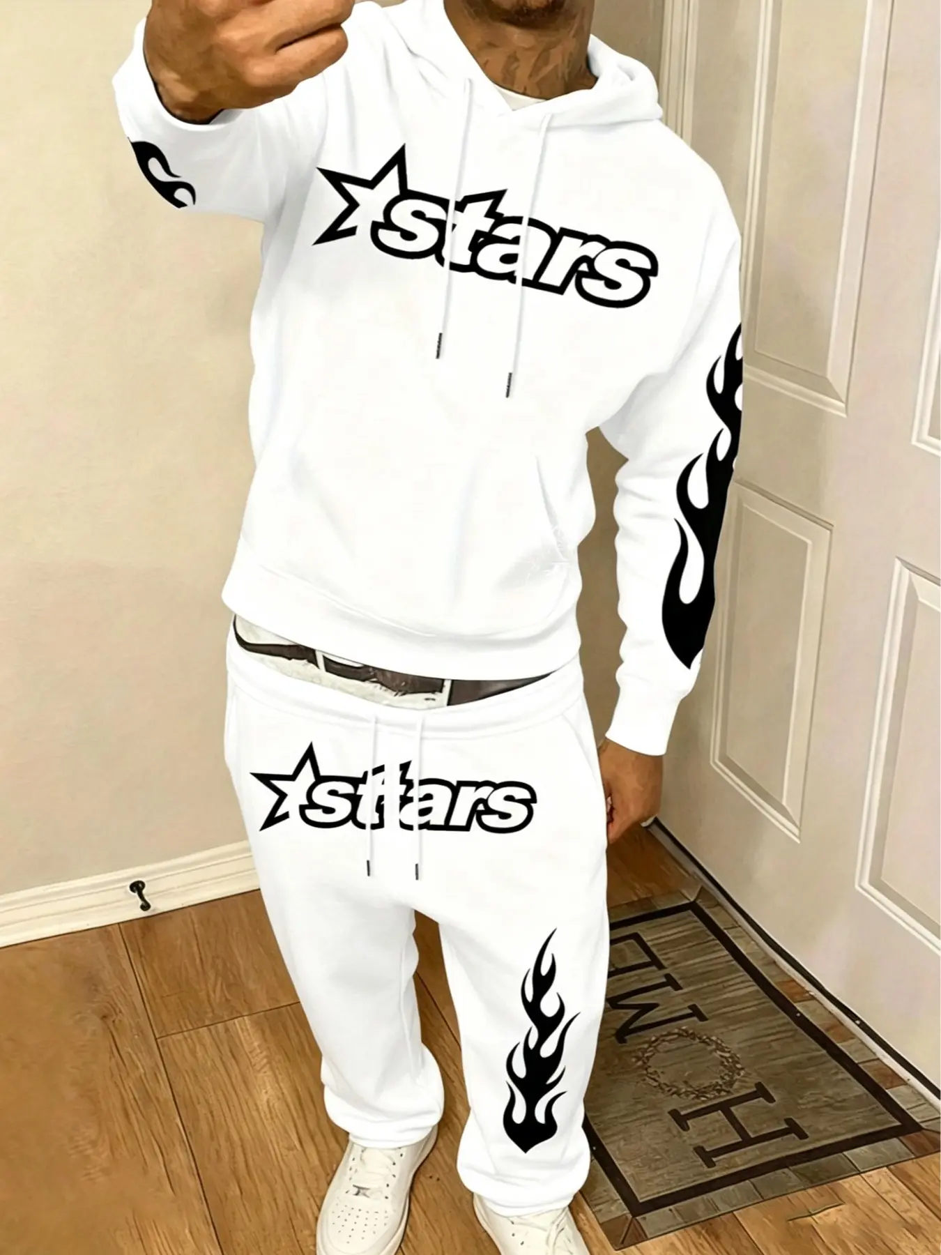 Men's Two-Piece Black-and-White Flame Print Tracksuit, Hoodie and Jogger Pants Set with Eye-Catching Stars Pattern. Made of Soft Fabric, Equipped with Adjustable Drawstrings, Kangaroo Pockets, Ribbed Cuffs and Hem. Loose Streetwear Style, Ideal for Hip-Ho