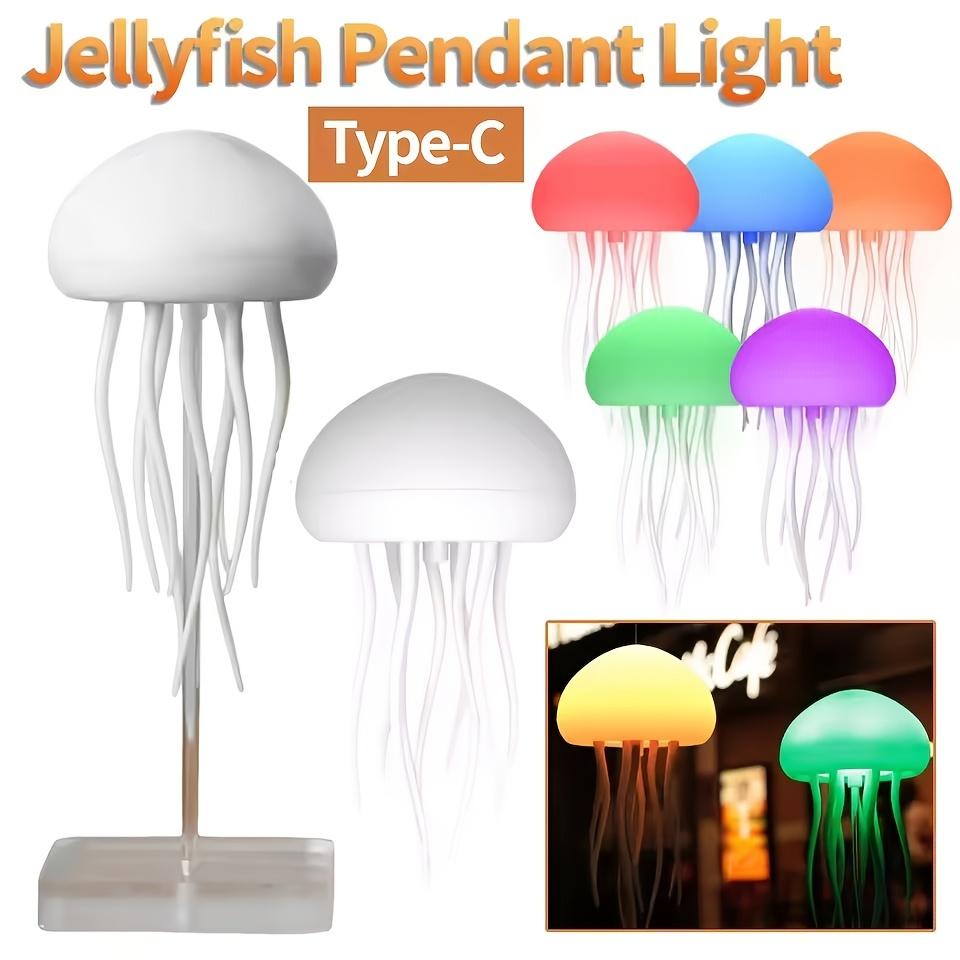 A Contemporary LED Lamp Designed Like a Jellyfish, Featuring Voice Control, a 2000Mah Lithium Battery, Full-Color Gradients, And Realistic Tentacles. It Offers an Extended Battery Life And Can Be Used As a Freestanding Or Hanging Decoration for Your