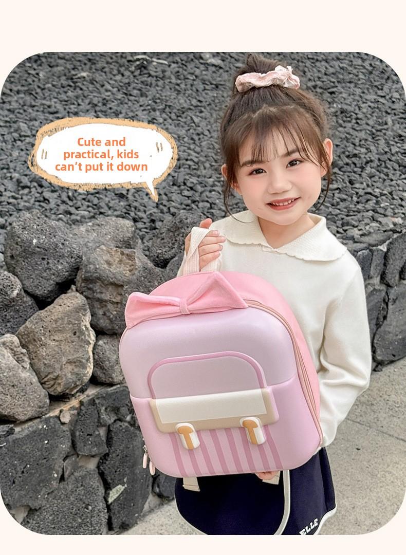 Kindergarten and primary school student backpack with sweet bow, lightweight eggshell double-shoulder bag for boys and girls, new trendy children's backpack