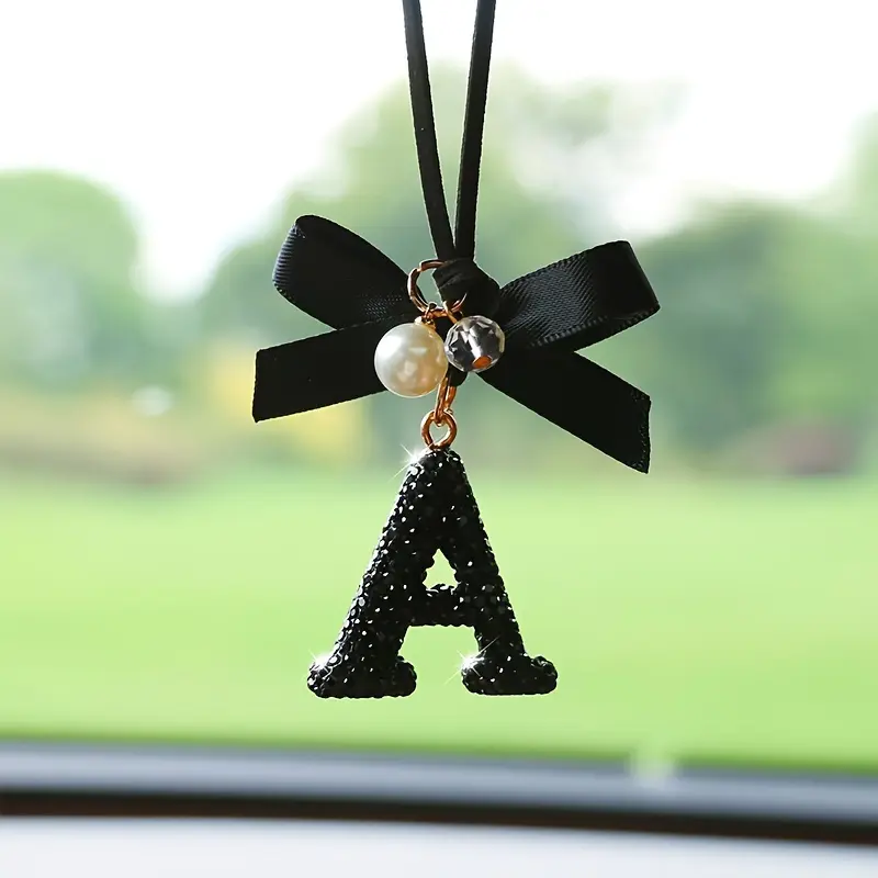 Exquisite Crystal Alphabet Letter Hanging Ornament - Sparkling Bowknot, Faux Pearl Accents, Fashionable Vehicle Mirror Decoration, Perfect English Letter Charm for Personalized Car Accessories
