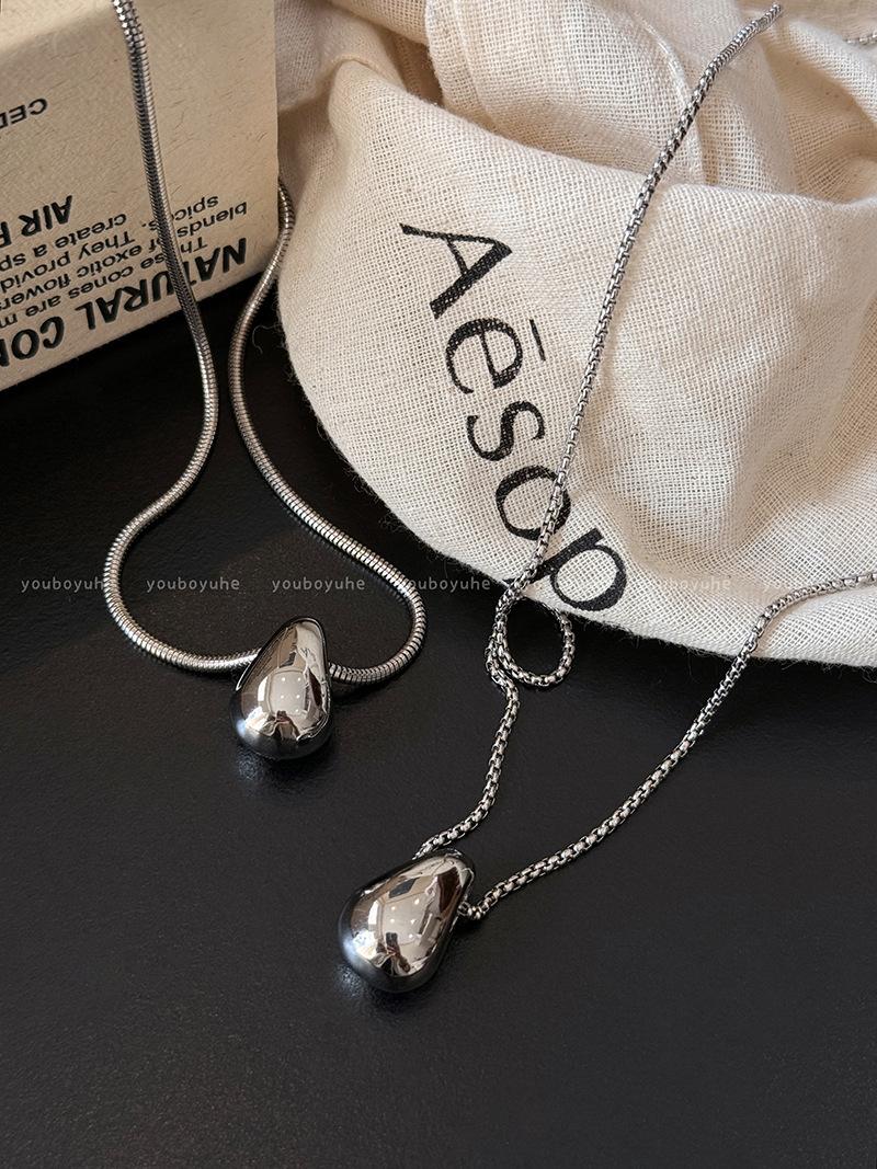Minimalist Silver Teardrop Titanium Steel Necklace for Women | High-End Long Sweater Chain | Edgy Cool Tone Fashion Accessory
