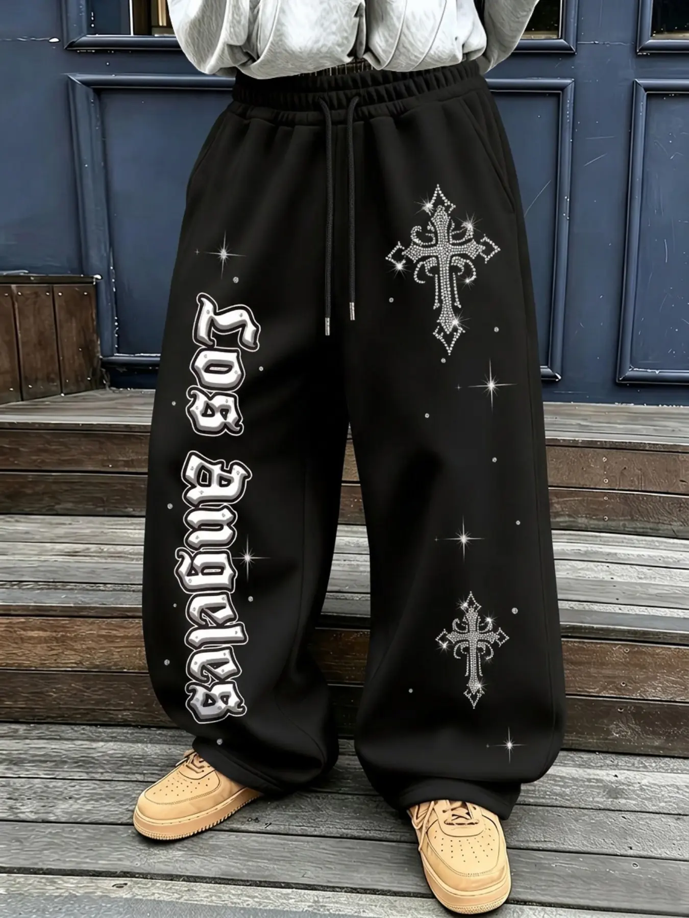 Y2K-style American dark goth wide-leg sweatpants adorned with rhinestone crosses, retro Los Angeles letter print, elastic waist, loose hip-hop street jogger trousers, unisex design, suitable for standalone wear in spring and autumn and inner layering
