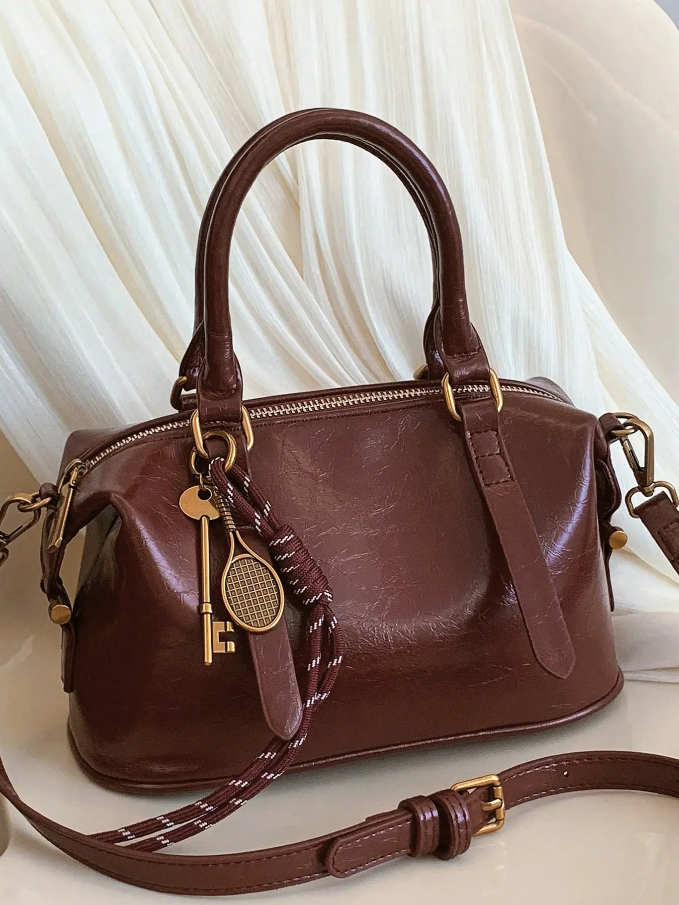 Elegant retro style versatile textured handbag with key, tennis racket, and woven rope element pendant design, fashionable niche design single shoulder crossbody bag, can accommodate mobile phones, lipstick, Casual Trendy Handbag