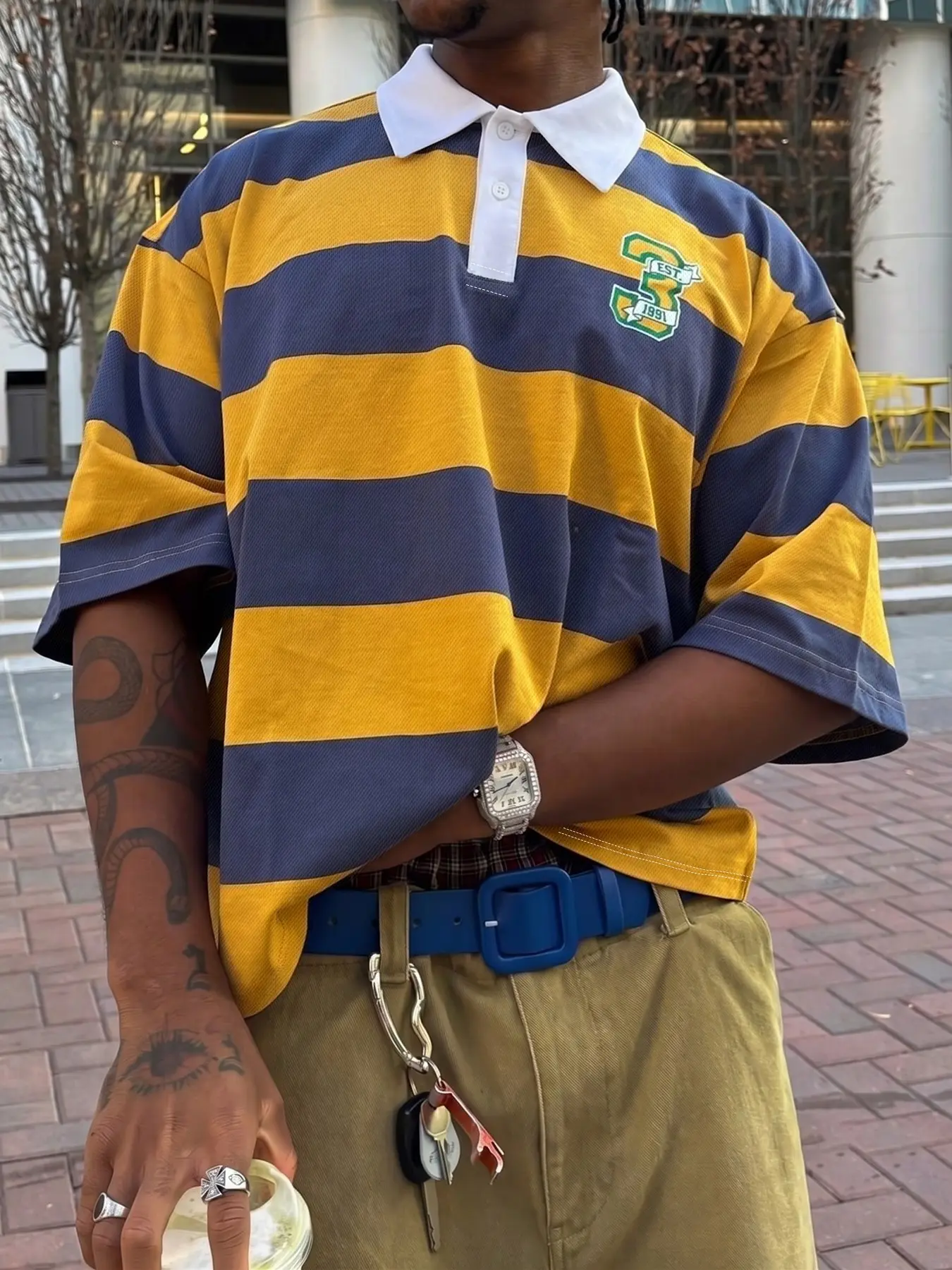Trendy oversized striped rugby polo shirt - No. 3 1991 pattern, breathable fabric, loose fit, casual, yellow and blue color scheme, a must-have for streetwear style for both men and women. Upgrade your everyday look now.
