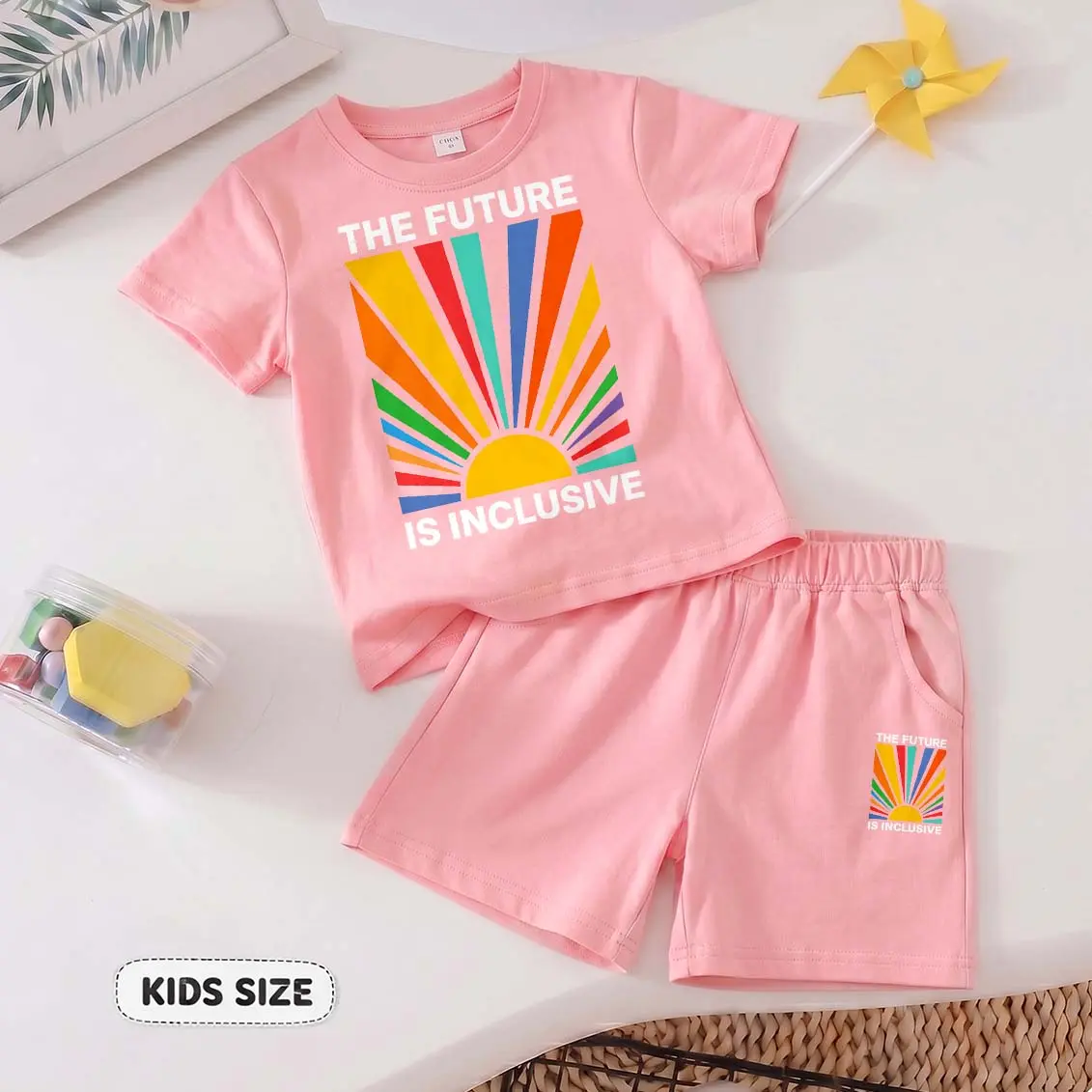 Kids’ "The Future Is Inclusive” Cartoon Print Short-Sleeve T-Shirt And Shorts Set—Casual Summer Kids' Clothing. This Round-Neck Outfit Combination Is Perfect For Everyday Wear And Outdoor Play.