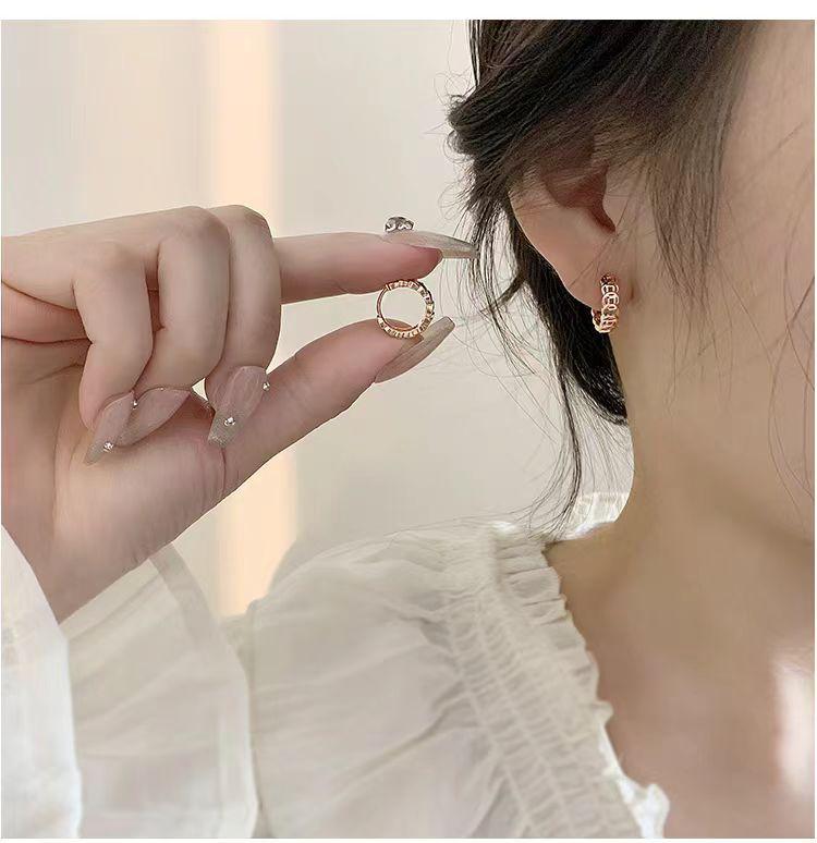 European and American retro style money earrings, versatile earrings, new fashionable plated hollowed-out copper coin ear buckles