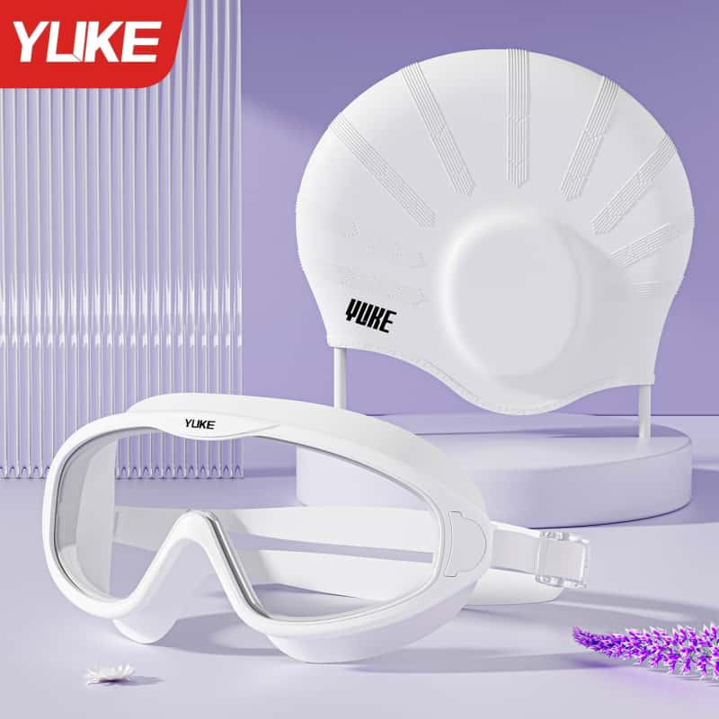 2-piece swim cap and goggles set designed to protect your ears and fit long hair perfectly