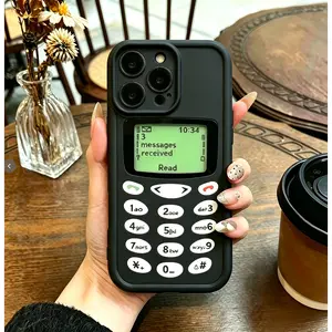 A creative, shock-resistant black silicone phone case in a retro style, featuring a printed numeric keypad design and a wrist strap. This silicone case is compatible with the iPhone 17 Pro Max, 16, 15, and 14 Pro Max.