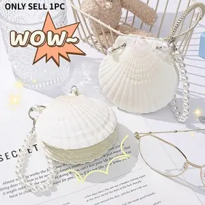 Notebook with 30 sheets of thick paper, featuring a creative "sea breeze, seashell, and pearl chain" design; portable pocket size with an elastic closure; minimalist style—suitable for office, study, travel, holiday gifts, and stationery use.