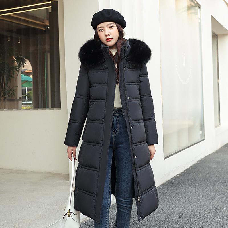 New winter women's thickened long over-the-knee hooded cotton-padded coat with large fur collar.